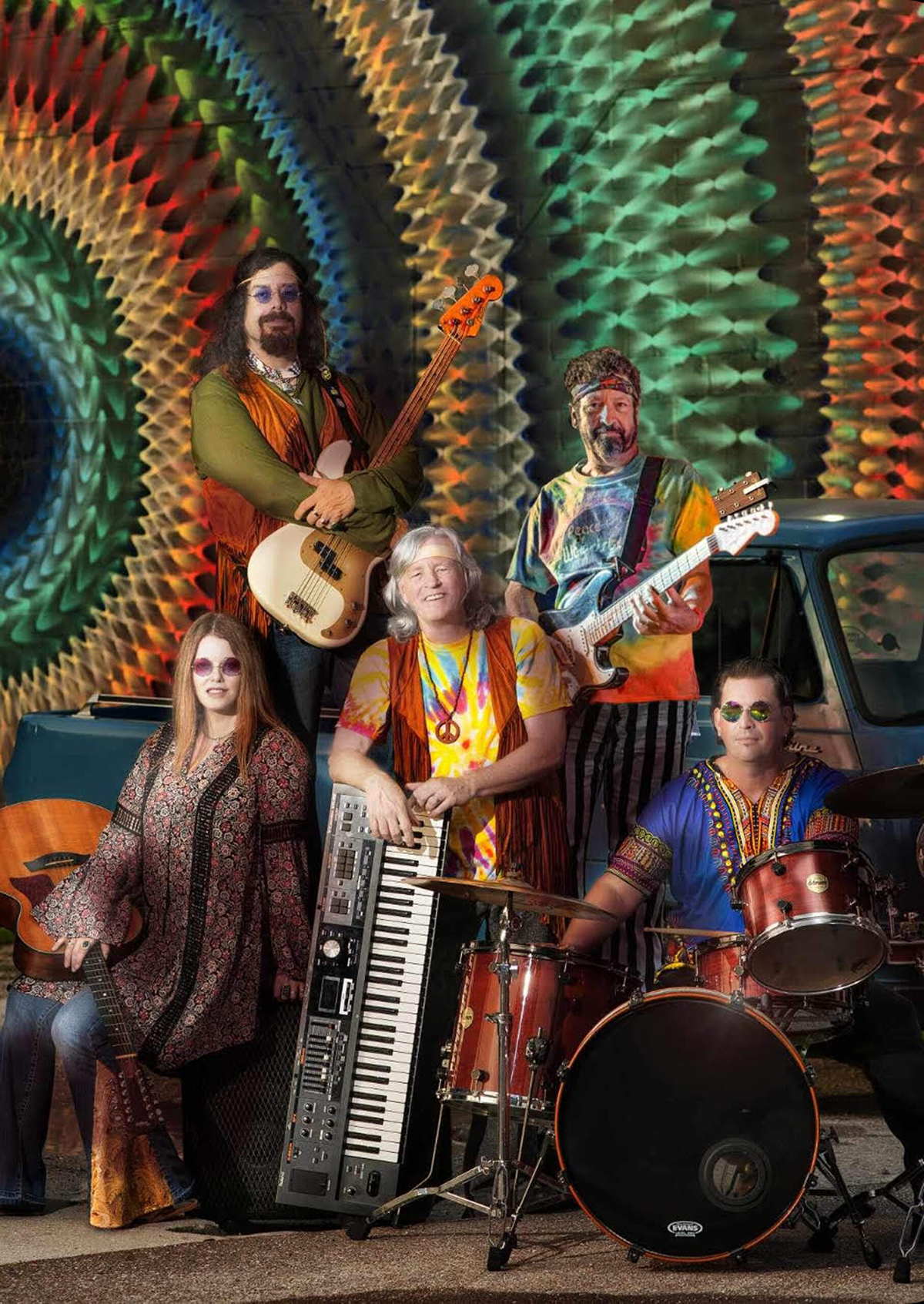 group photo of peace of woodstock band