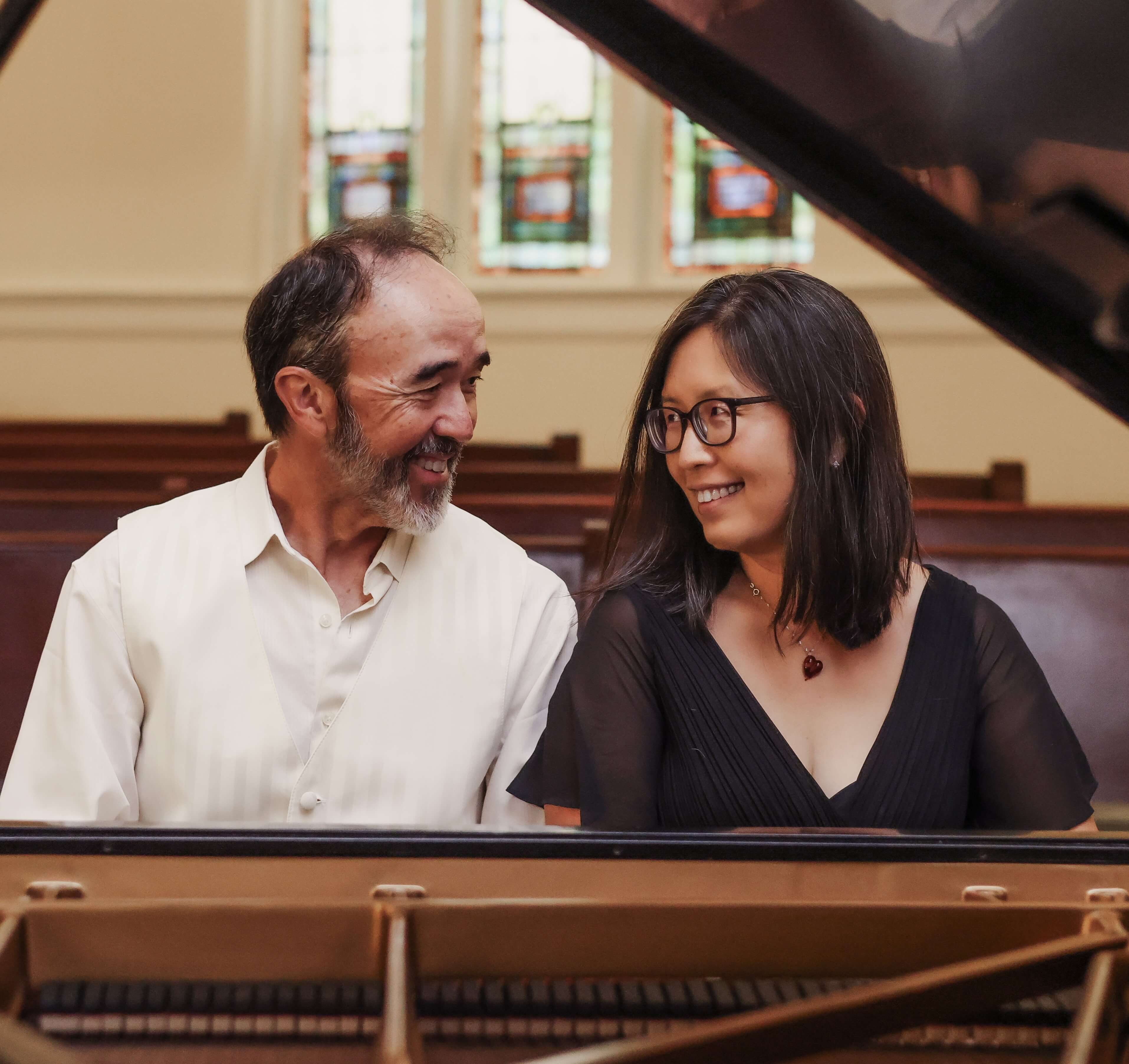 man and woman at piano